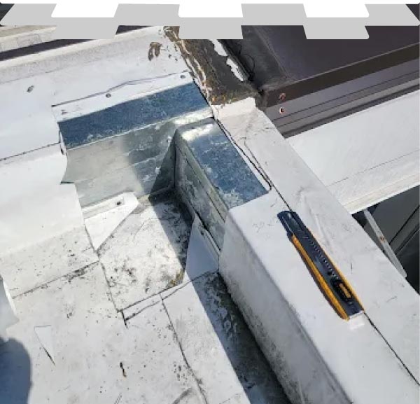 Precision commercial flat roof leak repair and metal flashing restoration by New Concept Roofing Inc., featuring durable waterproofing materials and professional utility tools on site