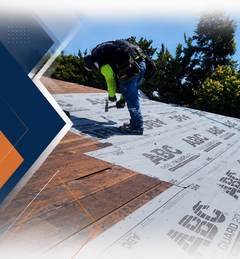 Experienced roofing crew from New Concept Roofing Inc. hand-installing architectural asphalt shingles on a residential roof replacement project using safety equipment under sunny conditions.
