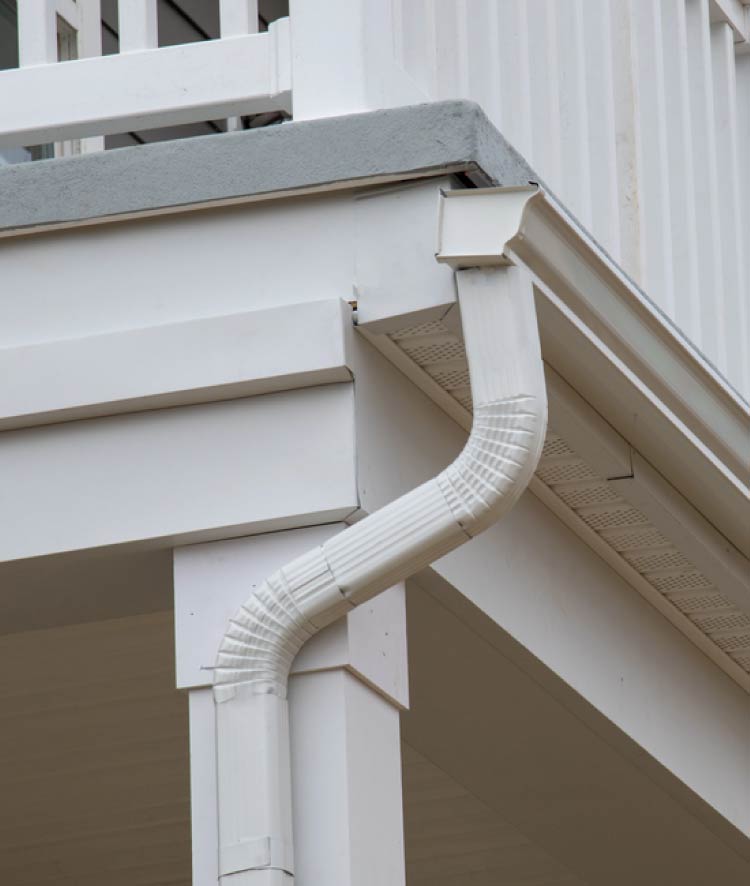 Gutters in San Jose - white aluminum downspout installation by New Concept Roofing Inc.