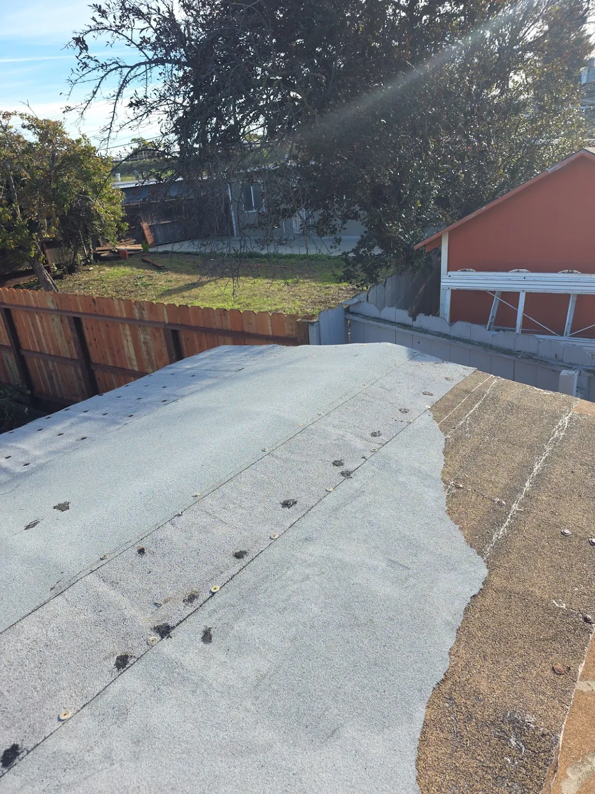 Old worn asphalt shingle roof before replacement roofing  in fremont, CA by New Concept Roofing Inc.