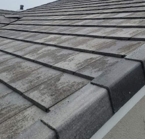 Close-up of newly installed concrete tile roofing in Newark, CA by New Concept Roofing Inc.